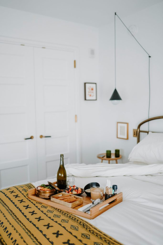 white ceramic mug on brown wooden table